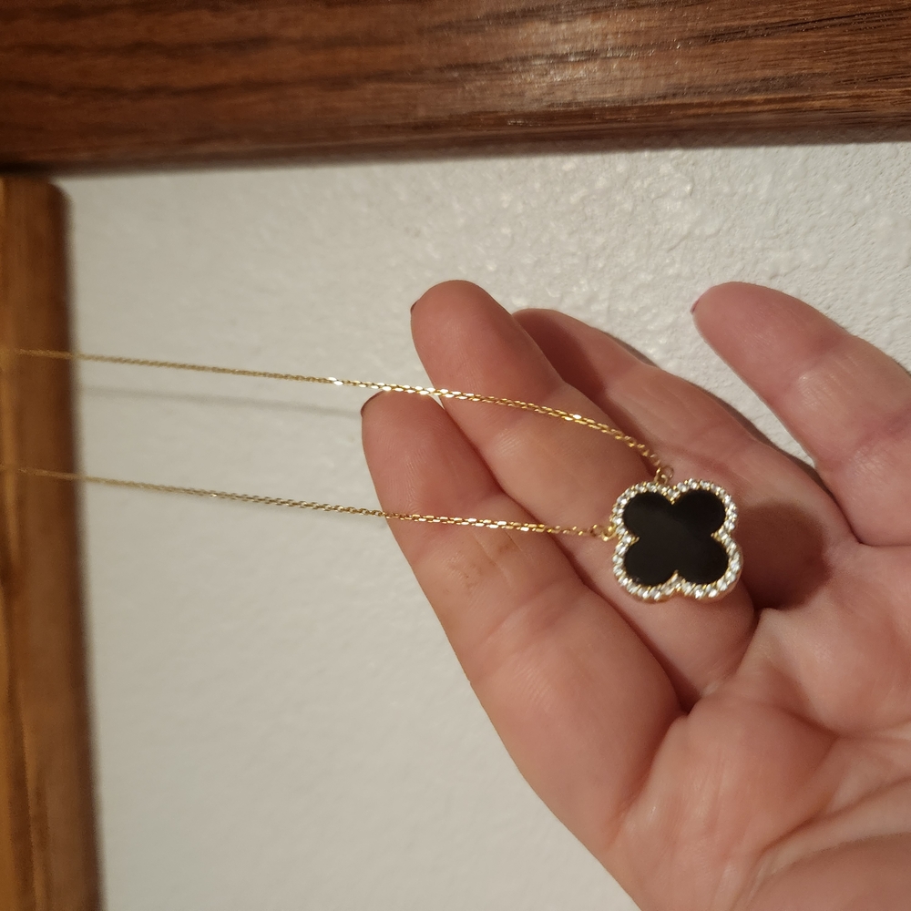 Elegant Black and Gold Clover Necklace